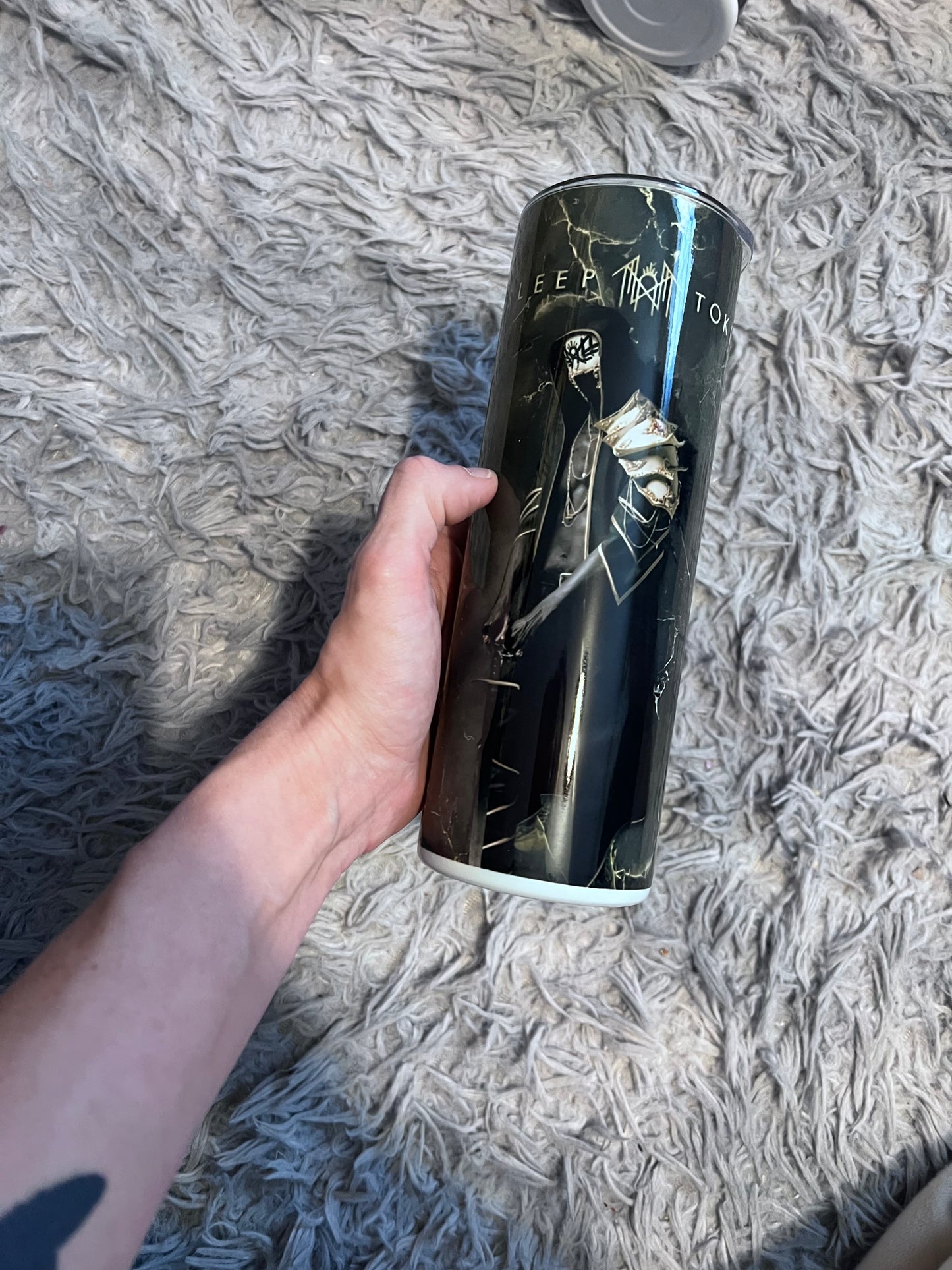 ST/ token-black and gold themed tumbler cup featuring the design artwork