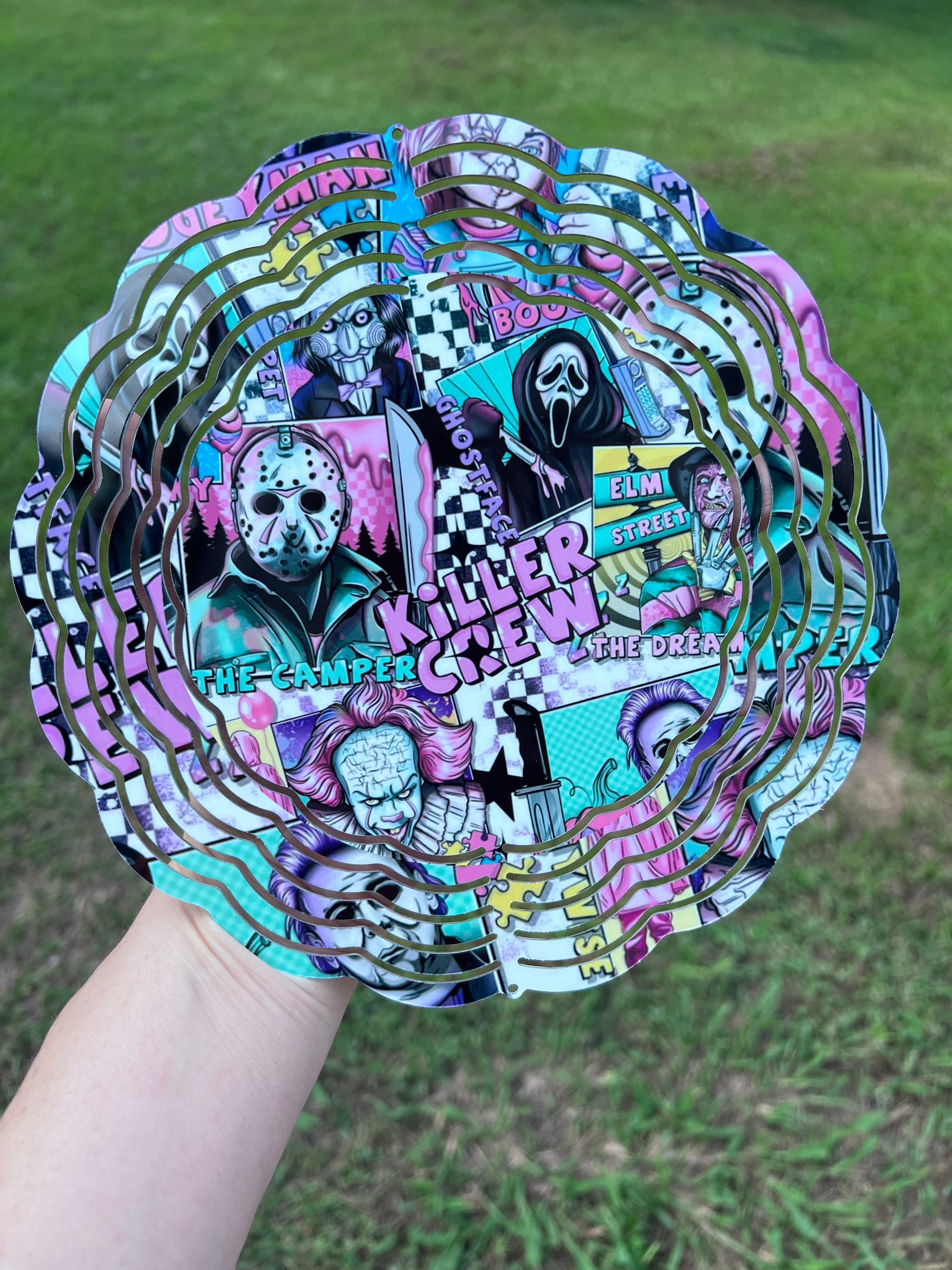Horror movie villains wind spinner featuring colorful slasher inspired artwork