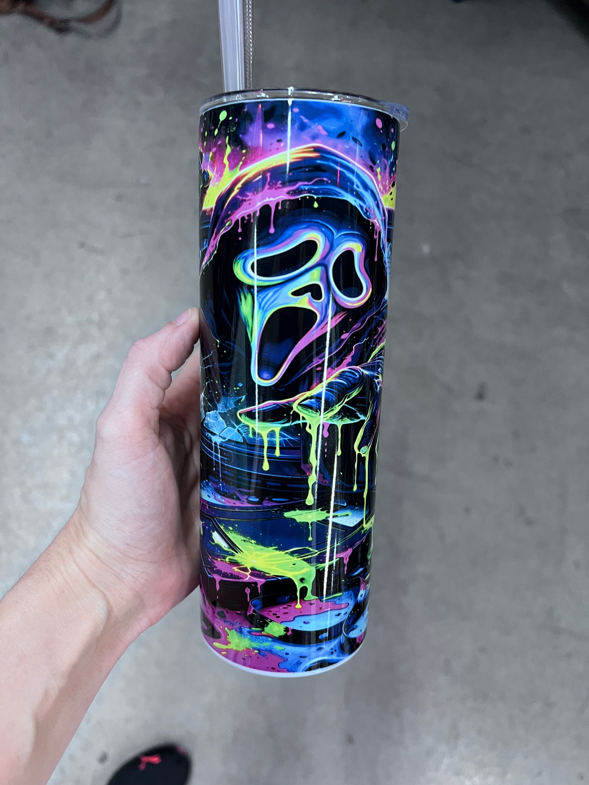 Neon horror Ghostface tumbler front view showcasing glowing mask and electric slime splatter⁠