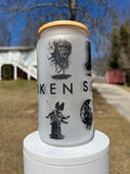 Frosted glass beer can with bamboo lid featuring black ink Sleep Token inspired art, Vessel figures, and gothic ritual symbols on a white pedestal.