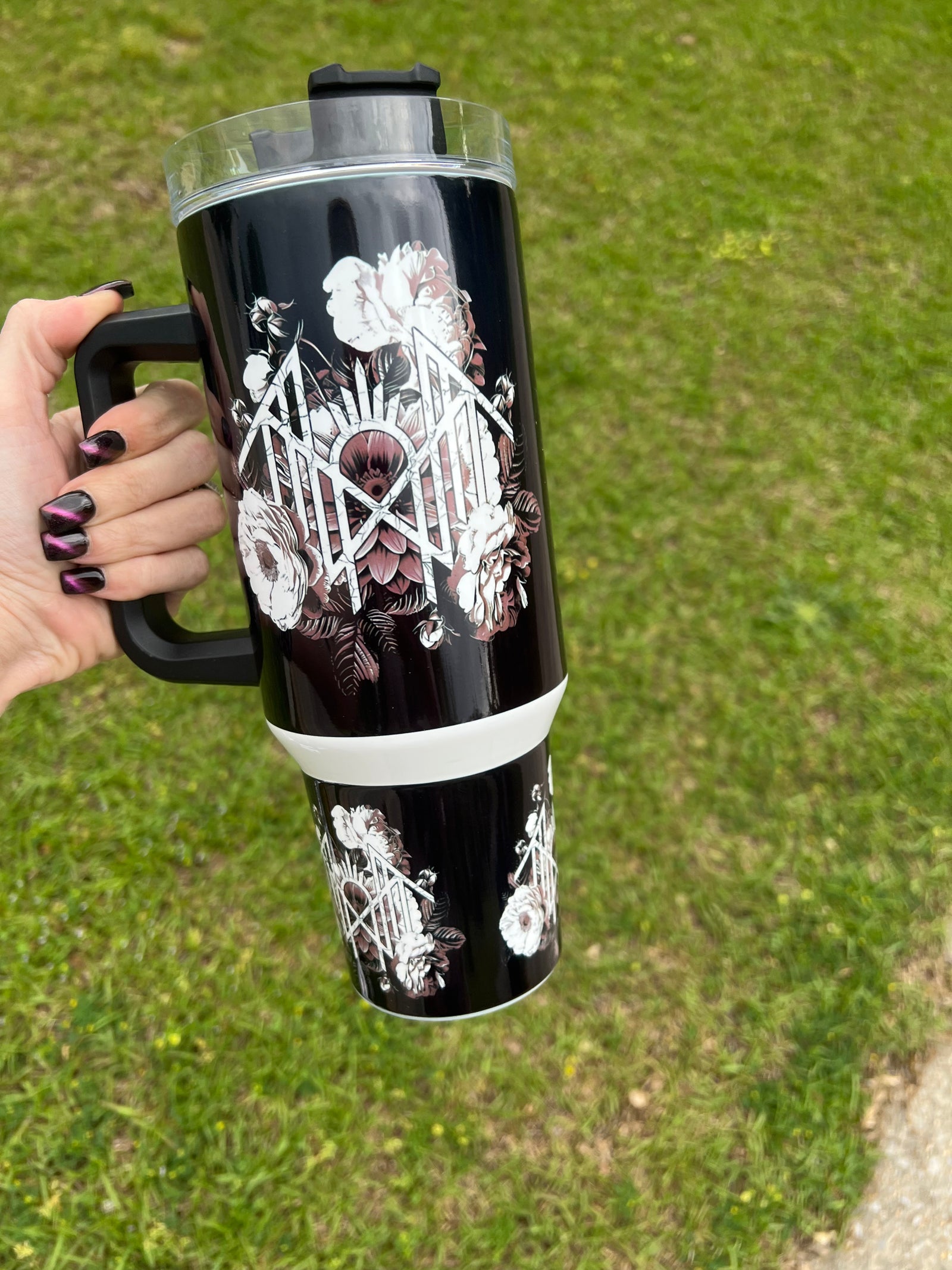 40oz white and black Sleep Token inspired tumbler with floral sigil design and handle.