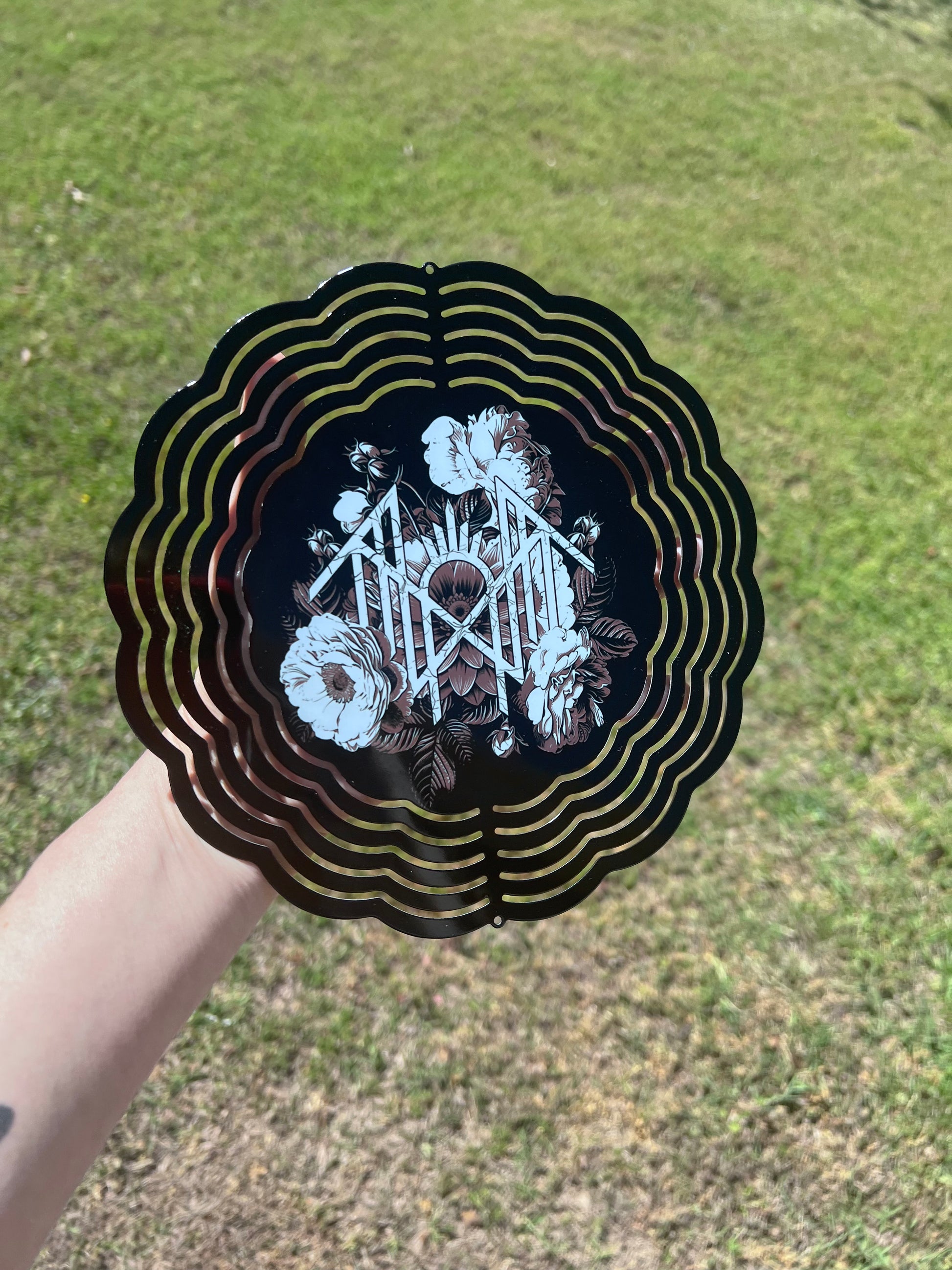 8in Floral Sleep Token Wind Spinner featuring fandom-inspired artwork