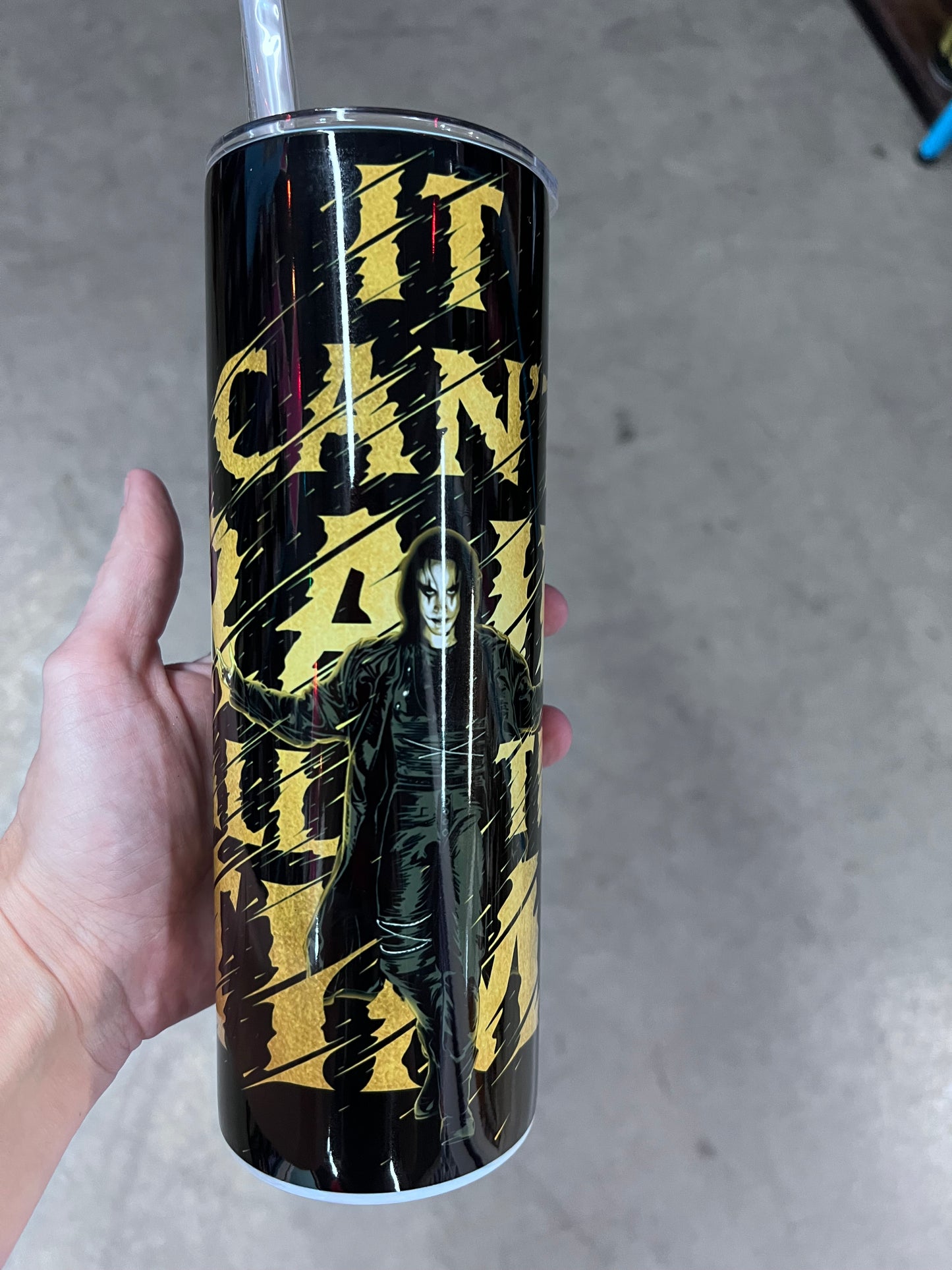The Crow tumbler featuring Eric Draven in a black and gold gothic design