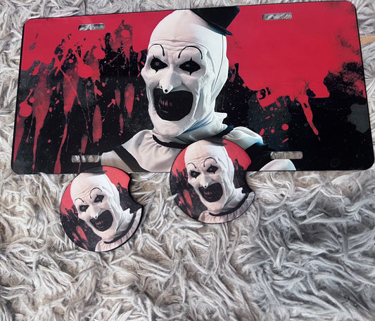 Art The Clown Horror Car Accessory Set | Terrifier Inspired Car Coasters & Vanity Plate | Spooky Horror Fan Car Decor featuring the design artwork