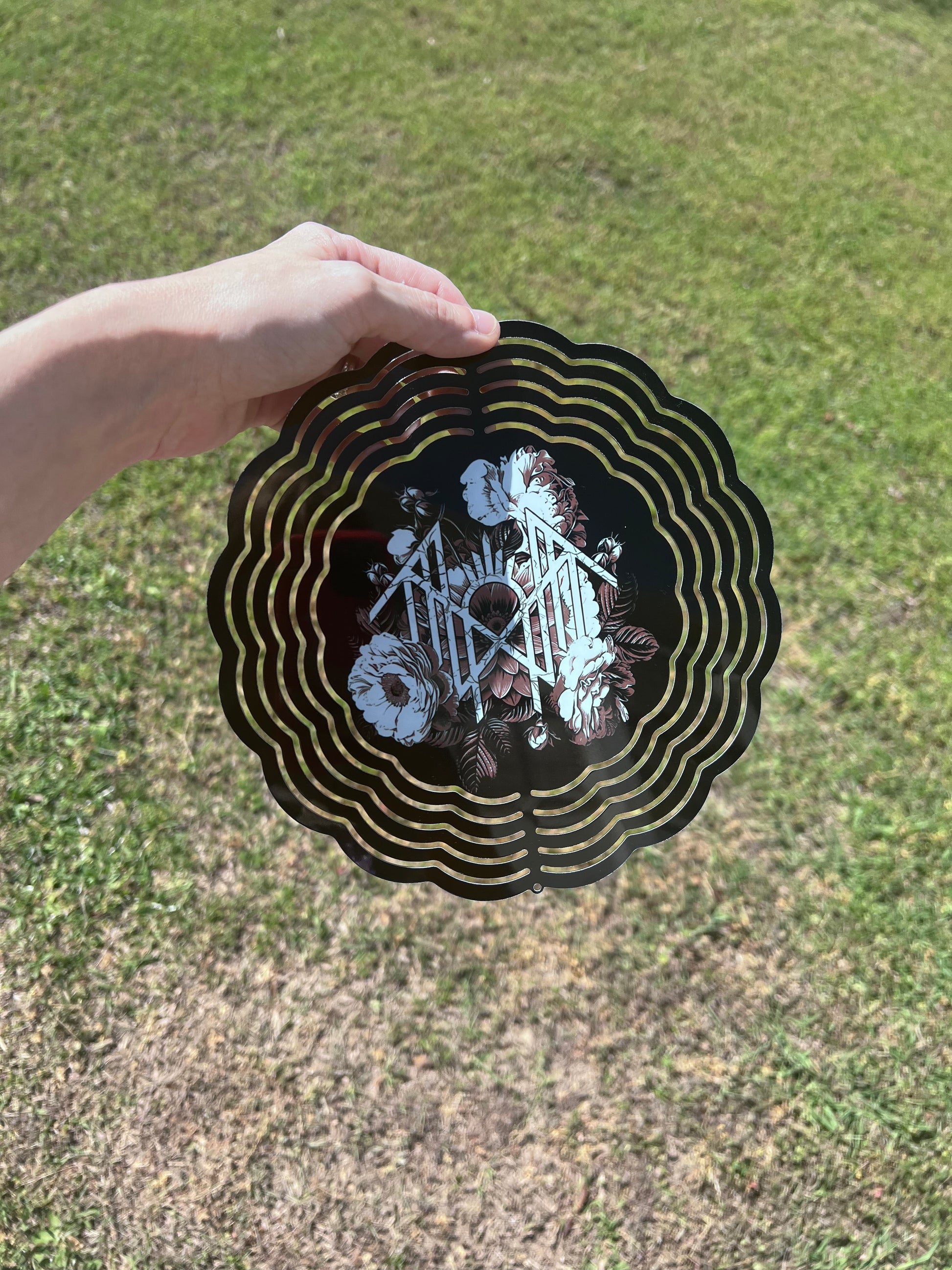 8in Floral Sleep Token Wind Spinner featuring fandom-inspired artwork