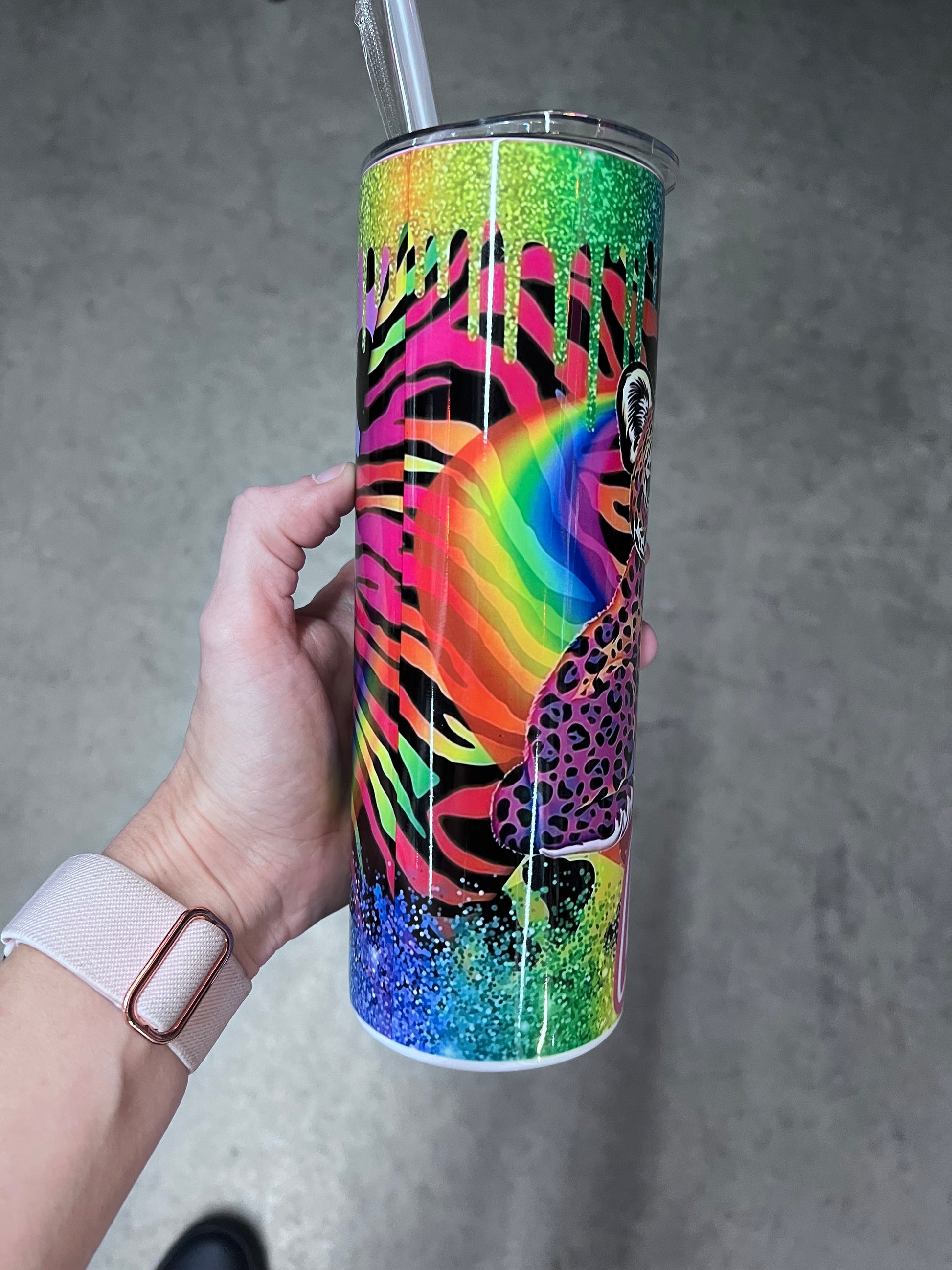 Lisa Frank inspired neon rainbow animal tumbler featuring colorful leopard and tiger artwork