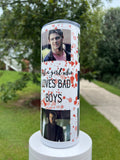 A 20oz skinny tumbler featuring portraits of Kai Parker and other TVD villains with the text "Just a girl who loves BAD BOYS" over a red blood-splatter