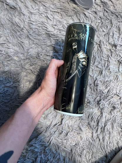 ST/ token-black and gold themed tumbler cup featuring the design artwork