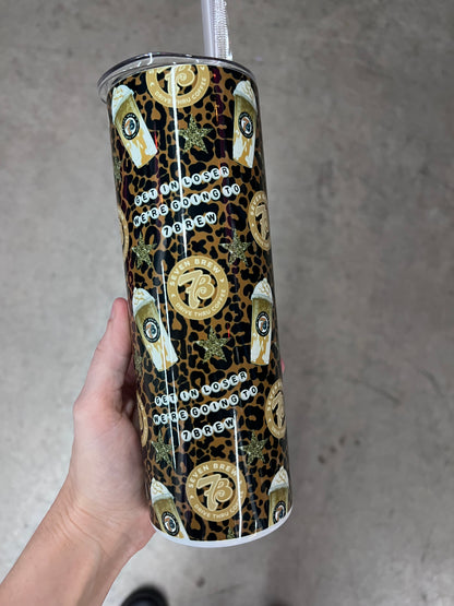 Detailed view of the 7 Brew round logo and iced coffee cup graphics on a custom tumbler