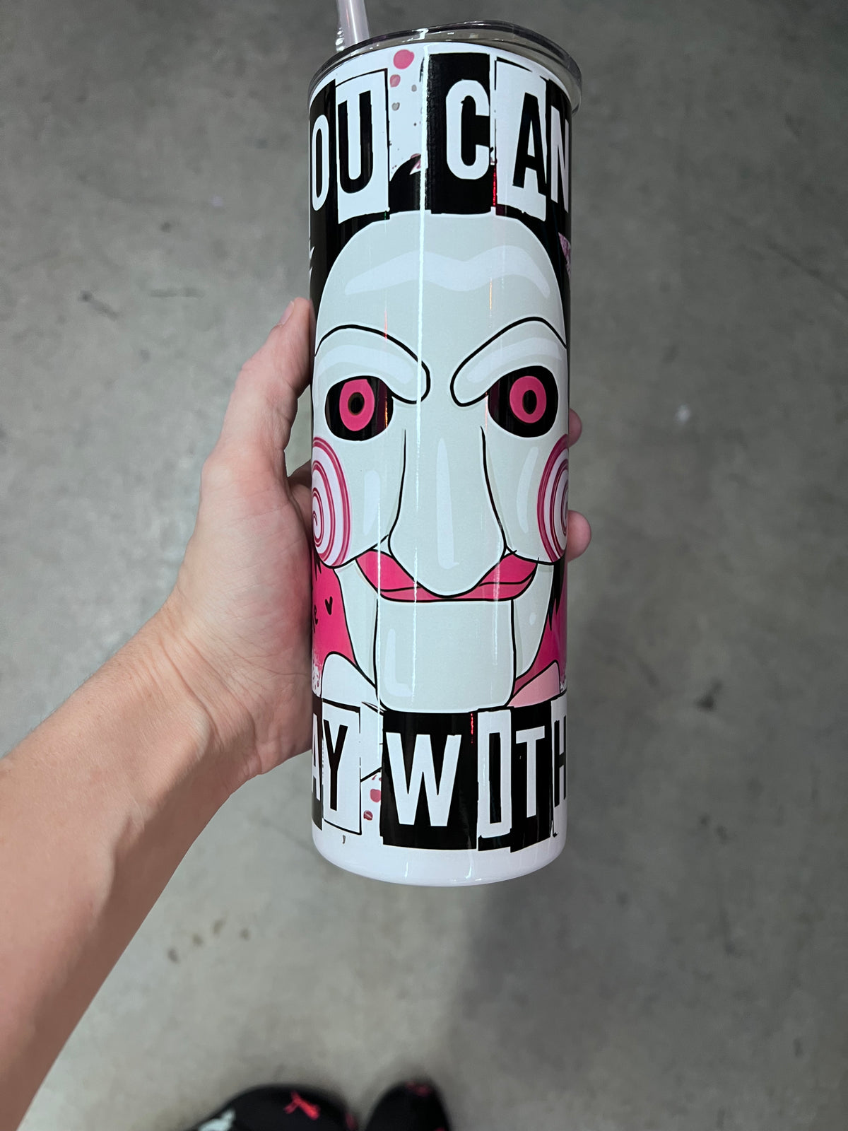 Saw Billy the Puppet tumbler side view featuring 'Make Your Choice' and pink splatter graphic details⁠