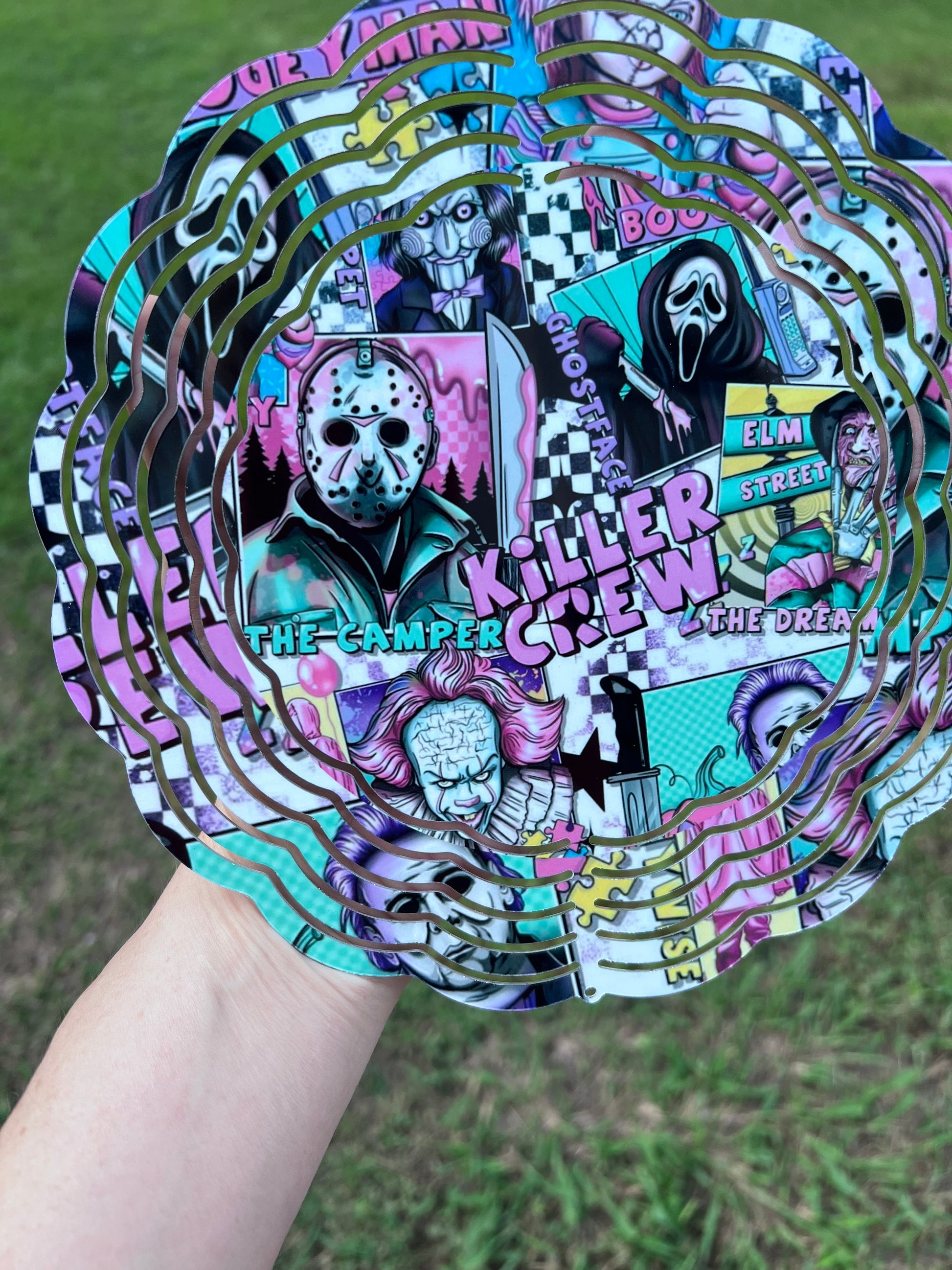 Horror movie villains wind spinner featuring colorful slasher inspired artwork