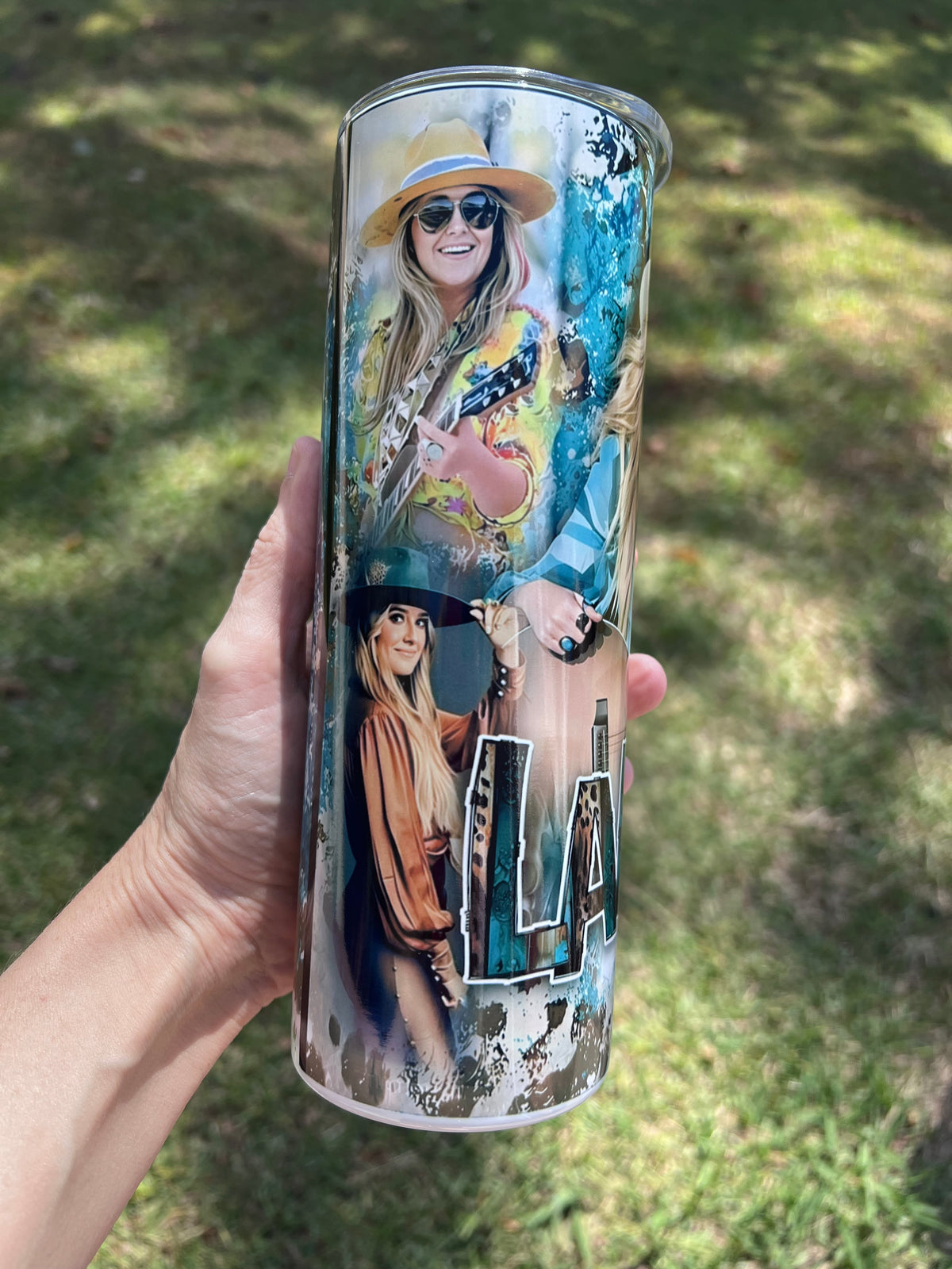 Lainey Wilson country music 20oz stainless steel tumbler cup with cowboy hat and acoustic guitar.
