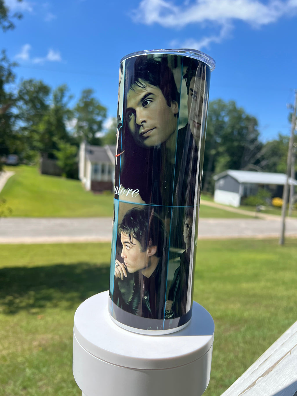 A 20oz skinny tumbler featuring a full-wrap photo collage of Damon Salvatore with "Damon Salvatore" written in elegant white script.